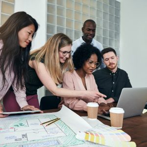 diverse-group-of-designers-working-together-in-an-2024-09-22-16-52-06-utc